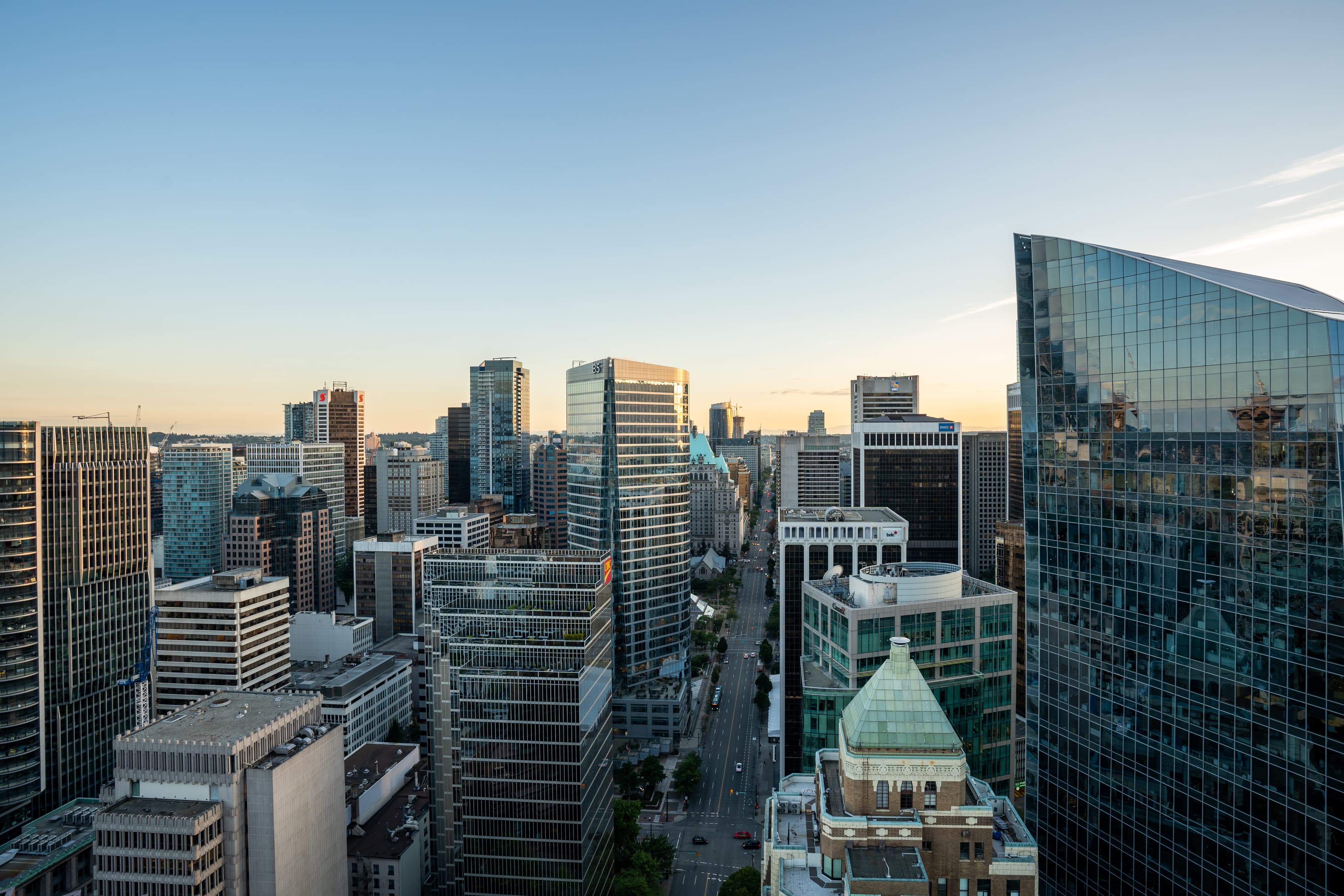 Vancouver skyline at sunset with glass skyscrapers